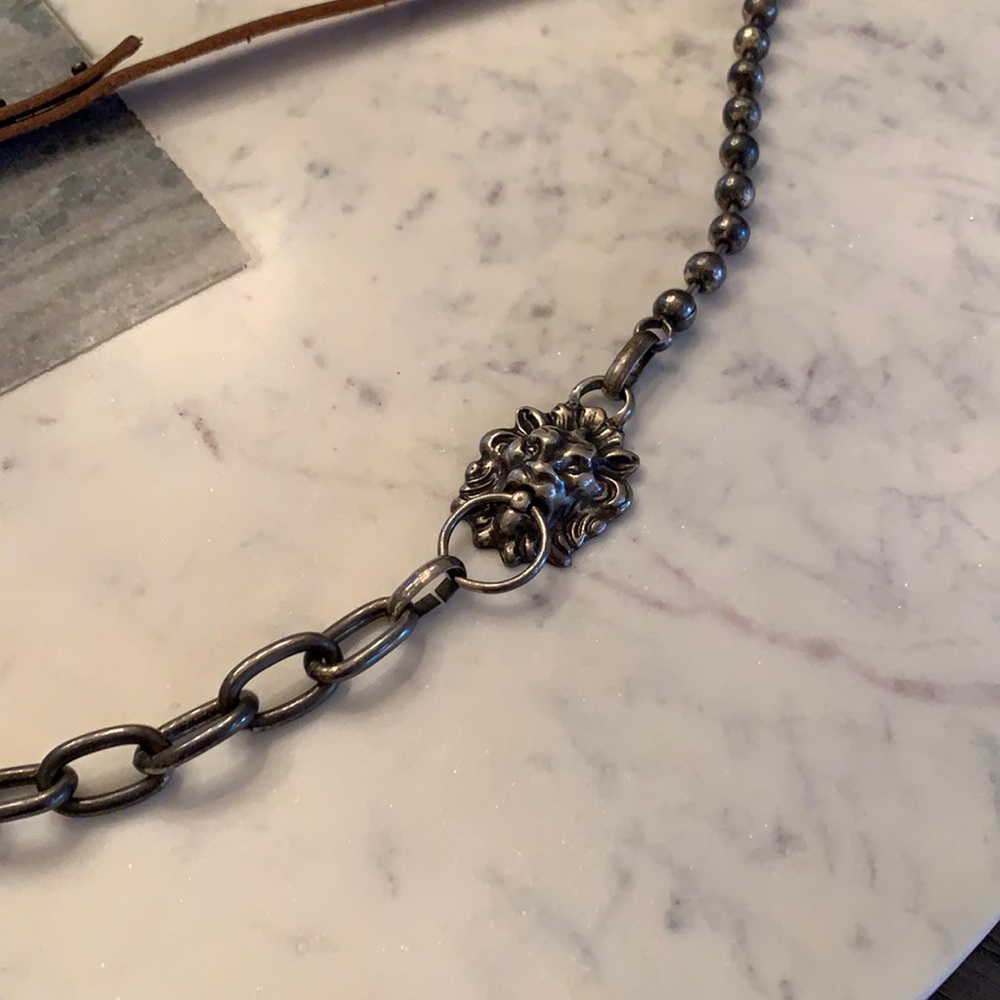 Lionhead and leather belt